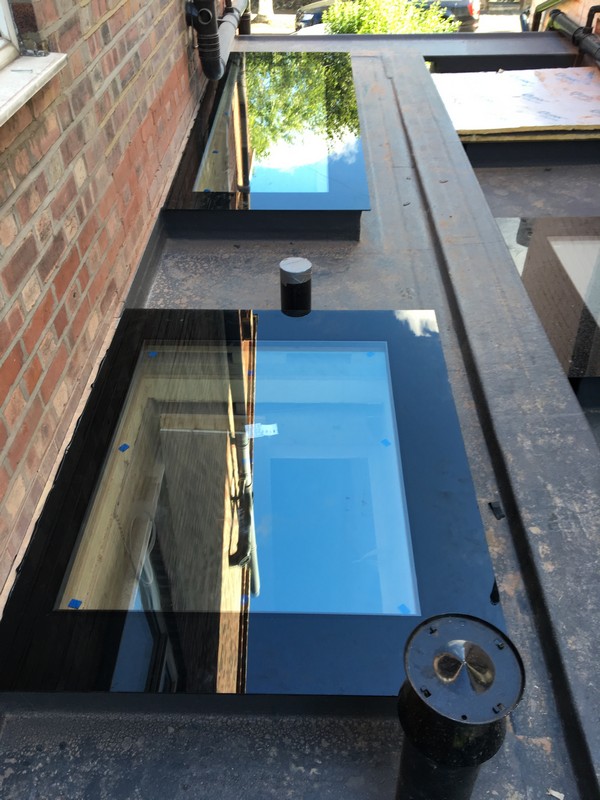Multiple flat roof skylights on extension in Southgate